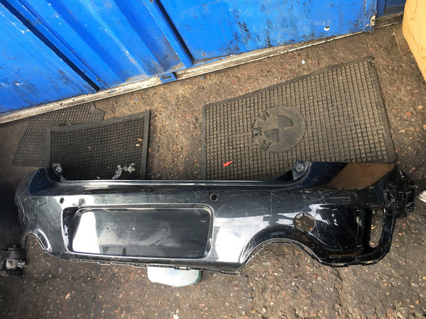 51129801898 MINI COUNTRYMAN 2011-2015 R60 COOPER S REAR BUMPER WITH SENSOR HOLES.
