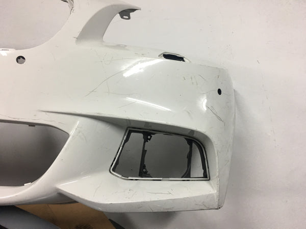 8060199 BMW 5 Series 2016 M-sport front bumper in white Needs slight repair Needs respray