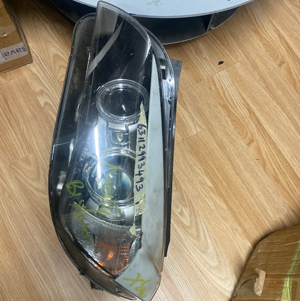 63112993493     BMW X1 2015 E84 passenger side Bi Xenon Headlight   2993493