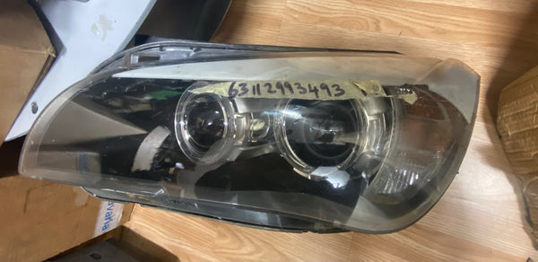63112993493     BMW X1 2015 E84 passenger side Bi Xenon Headlight   2993493