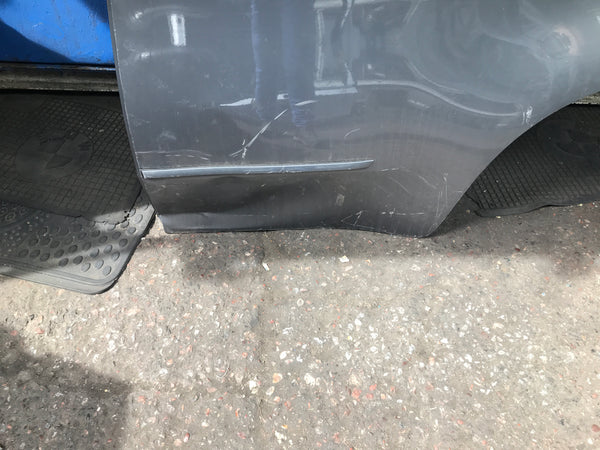 BMW X5 2009 passenger side rear bumper needs slight repair and respray