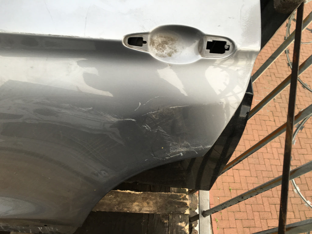BMW X3 PASSENGER SIDE DOOR SHELL IN SILVER NEEDS REPAIR