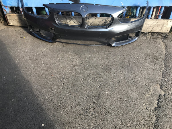 51117371736 BMW 1 Series 2018 f20 front bumper with camera and sensor holes